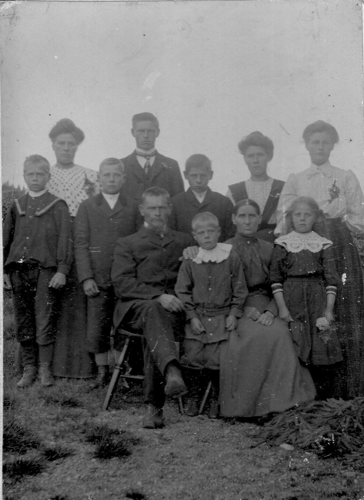 Perhaps somebody was getting married. The Daniel Jonorson family gathered in their  best clothes for what is probably the only family photograph they ever posed for.